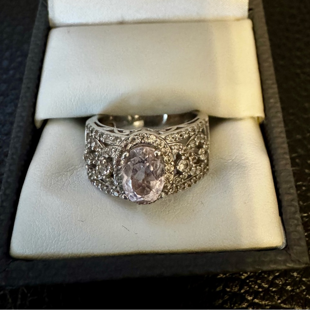 Oval Kunzite and Round White Zircon Rhodium over Sterling Silver. Size 7.